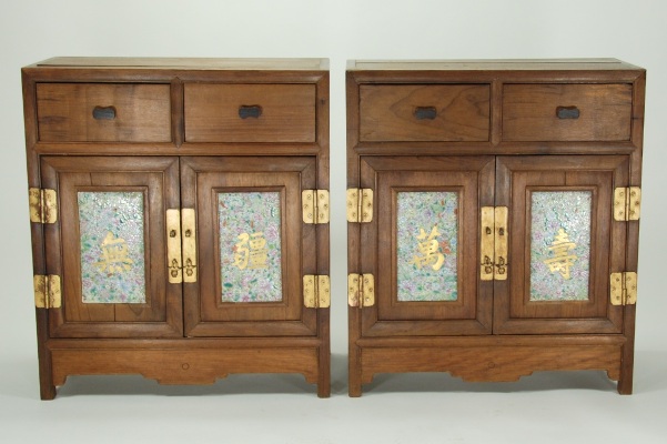 Appraisal: Each cabinet with two drawers and two hinged doors the