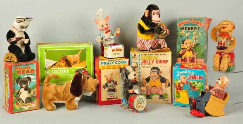 Appraisal: Lot of Japanese Battery-Operated Toys Description Working Toys with their