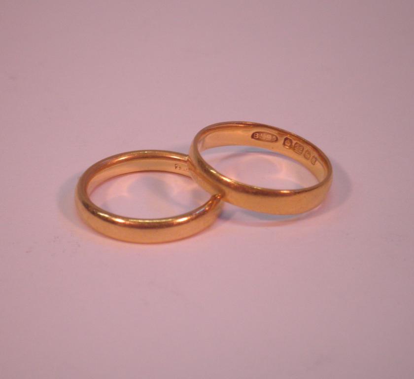 Appraisal: Two yellow metal wedding bands stamped ct grams gross