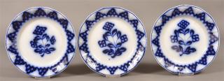 Appraisal: Flow Blue Ironstone Skeleton Flower Plates Three Flow Blue Ironstone