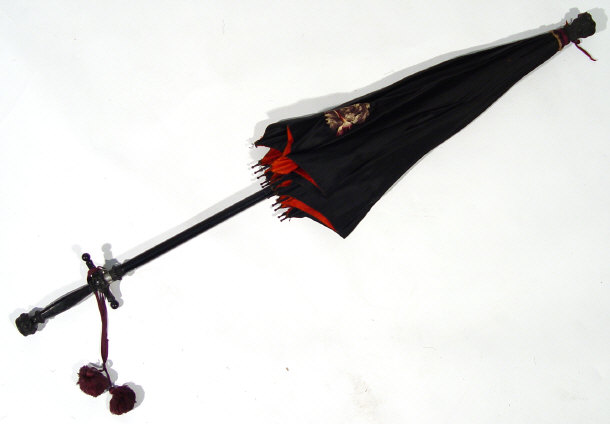 Appraisal: Victorian Prostitutes parasol with ebony cruciform handle fitted with a