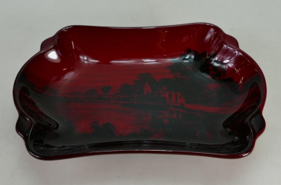 Appraisal: Royal Doulton flambe shaped tray decorated with a cottage in