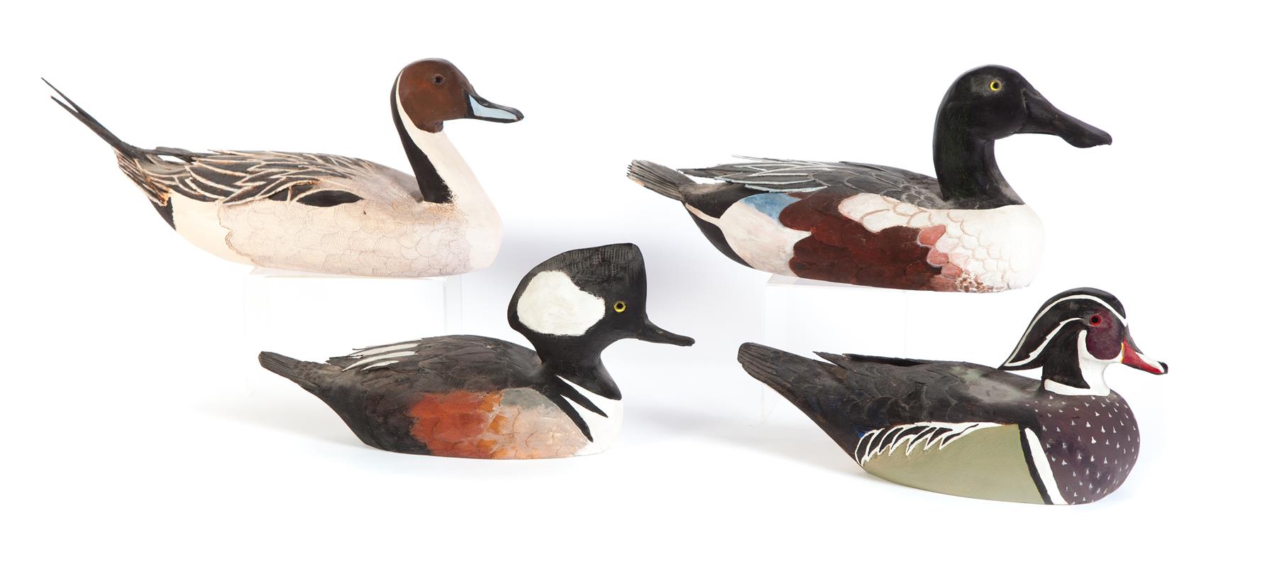 Appraisal: FOUR MORRIS MEYER CARVED AND PAINTED DUCK DECOYS American between