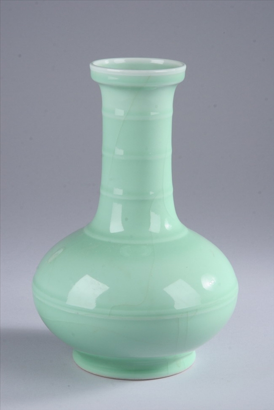 Appraisal: CHINESE APPLE GREEN PORCELAIN VASE Qianlong underglazed blue seal mark