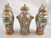 Appraisal: A trio of Chinese ceramic vase containers all with overglaze