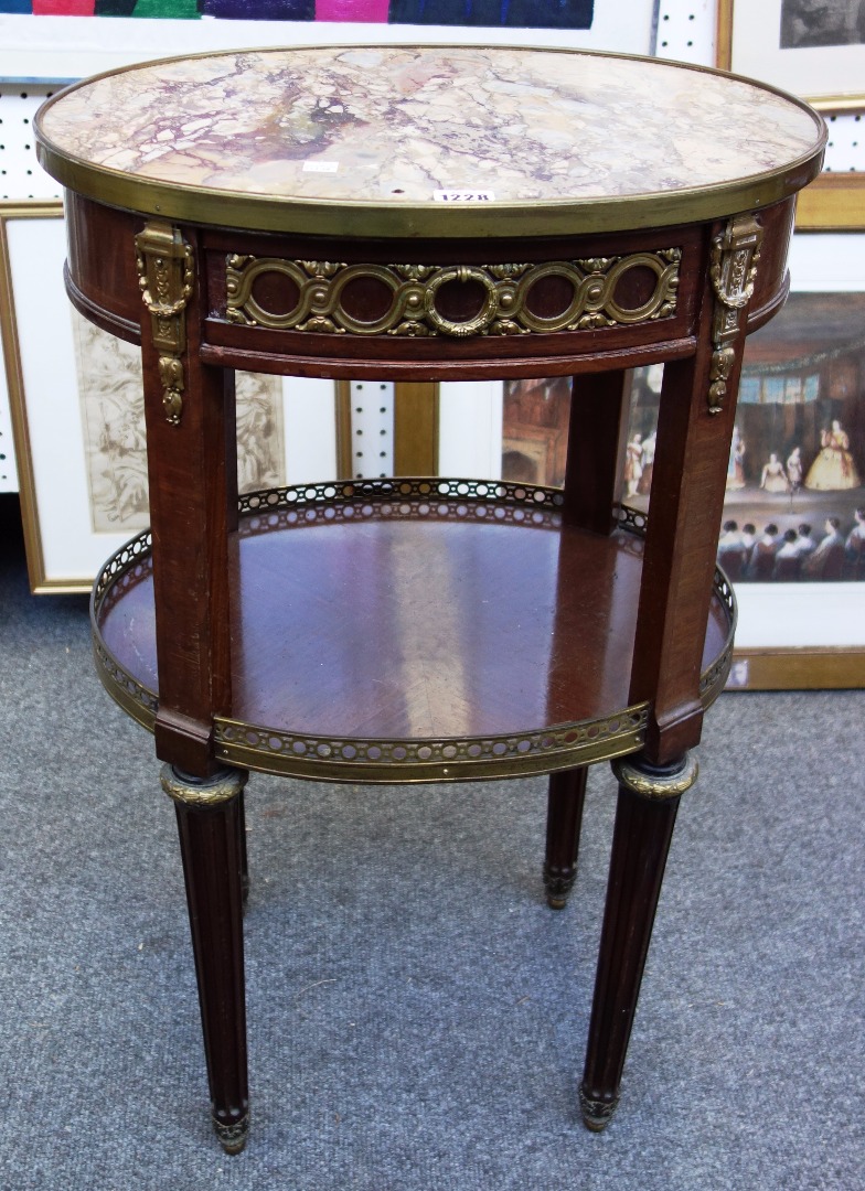 Appraisal: A Louis XVI style marble topped gilt metal mounted mahogany