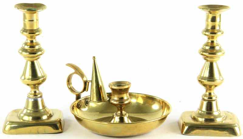 Appraisal: Three Brass Candlesticksincluding a pair of th century push-up candlesticks