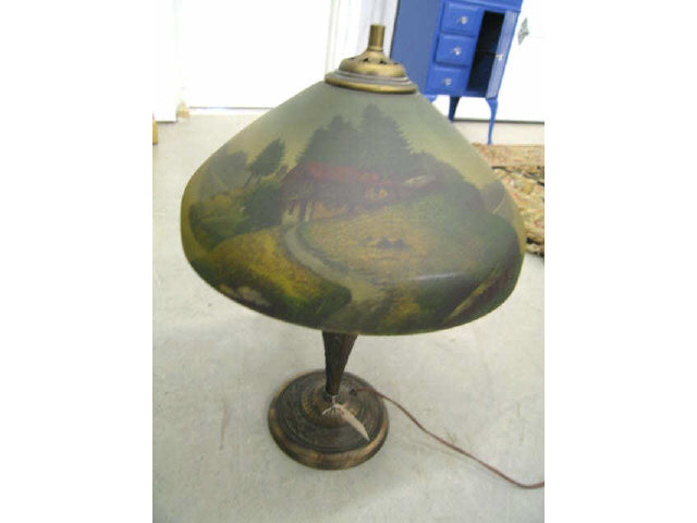 Appraisal: Antique Reverse Painted Lamp cabins beside a lake bronzed base