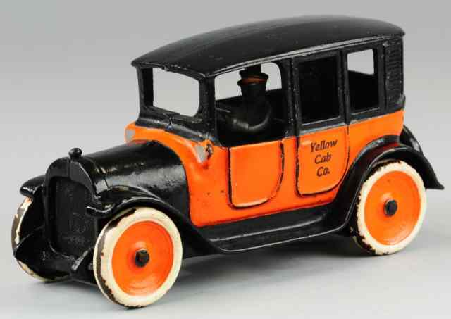 Appraisal: ARCADE YELLOW CAB Cast iron painted in familiar orange and