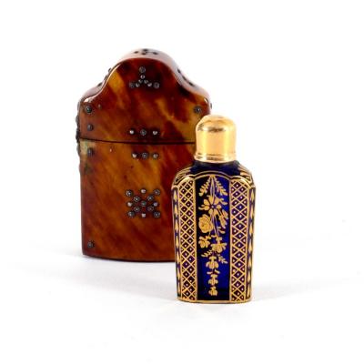 Appraisal: A Georgian tortoiseshell cased scent bottle the case with hinged