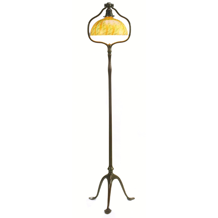 Appraisal: Tiffany Studios floor lamp bronzed three-footed base holding a white