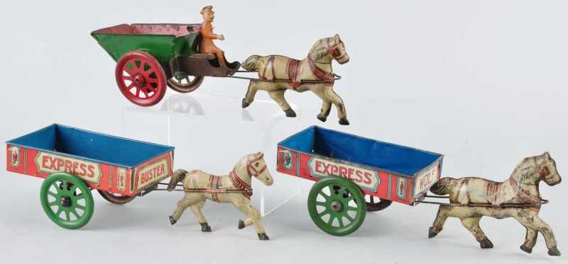 Appraisal: Lot of Tin Litho Chein Horse-Drawn Wagon Toys Description American