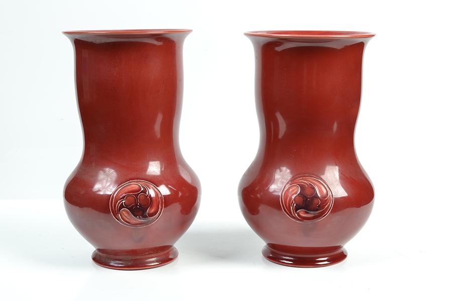 Appraisal: A PAIR OF MOORCROFT FLAMMINIAN WARE VASES baluster in form