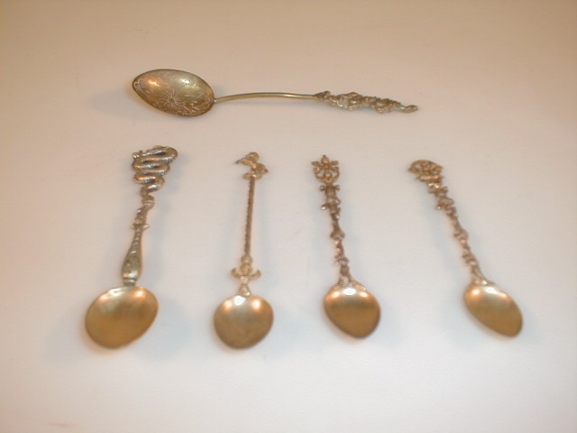 Appraisal: Three Italian silver gilt spoons cast foliate and spiral handles