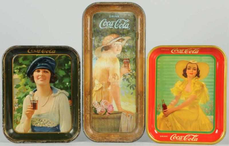 Appraisal: Lot of Coca-Cola Serving Trays Includes one one rectangular and