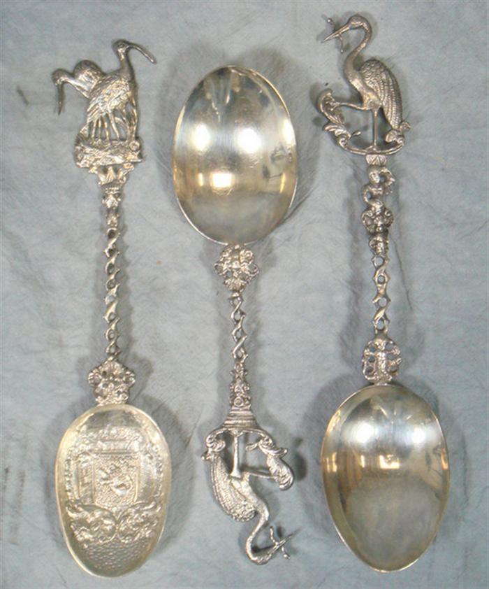 Appraisal: Dutch silver spoons with pelican tops one scenic and plain