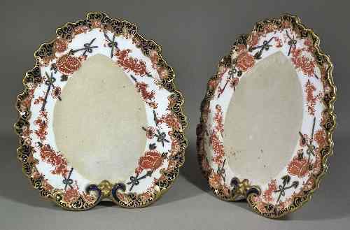 Appraisal: A pair of Royal Crown Derby bone china stands of