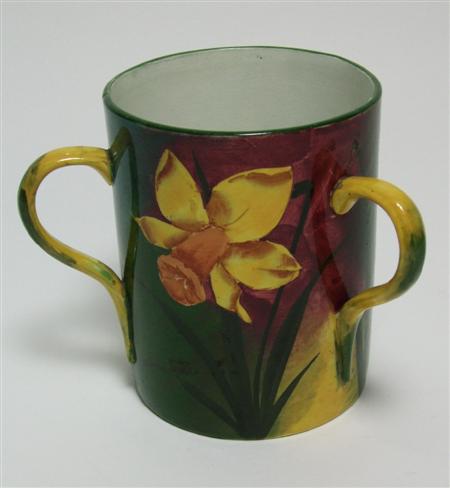 Appraisal: WEMYSS THREE-HANDLED MUG 'S decorated by Joe Nekola in the