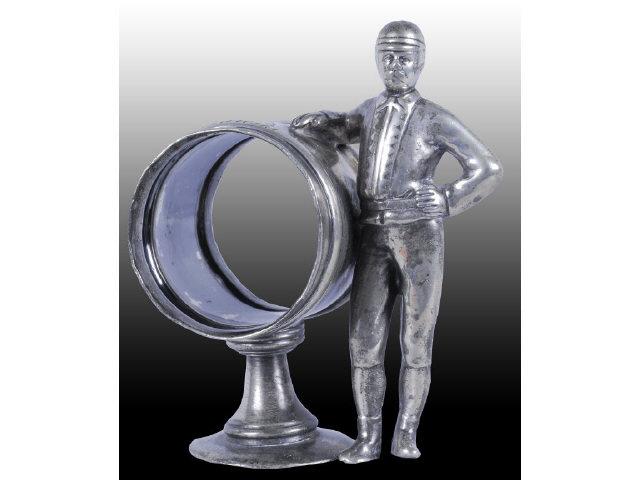 Appraisal: Man in Sports Attire Figural Napkin Ring Description Man stands