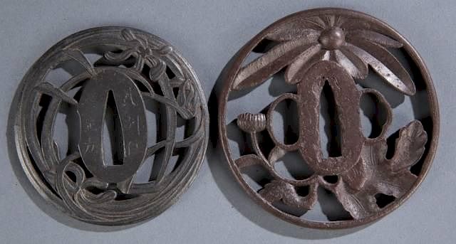 Appraisal: Two iron Tsuba Two Japanese tsuba Iron maru gata with