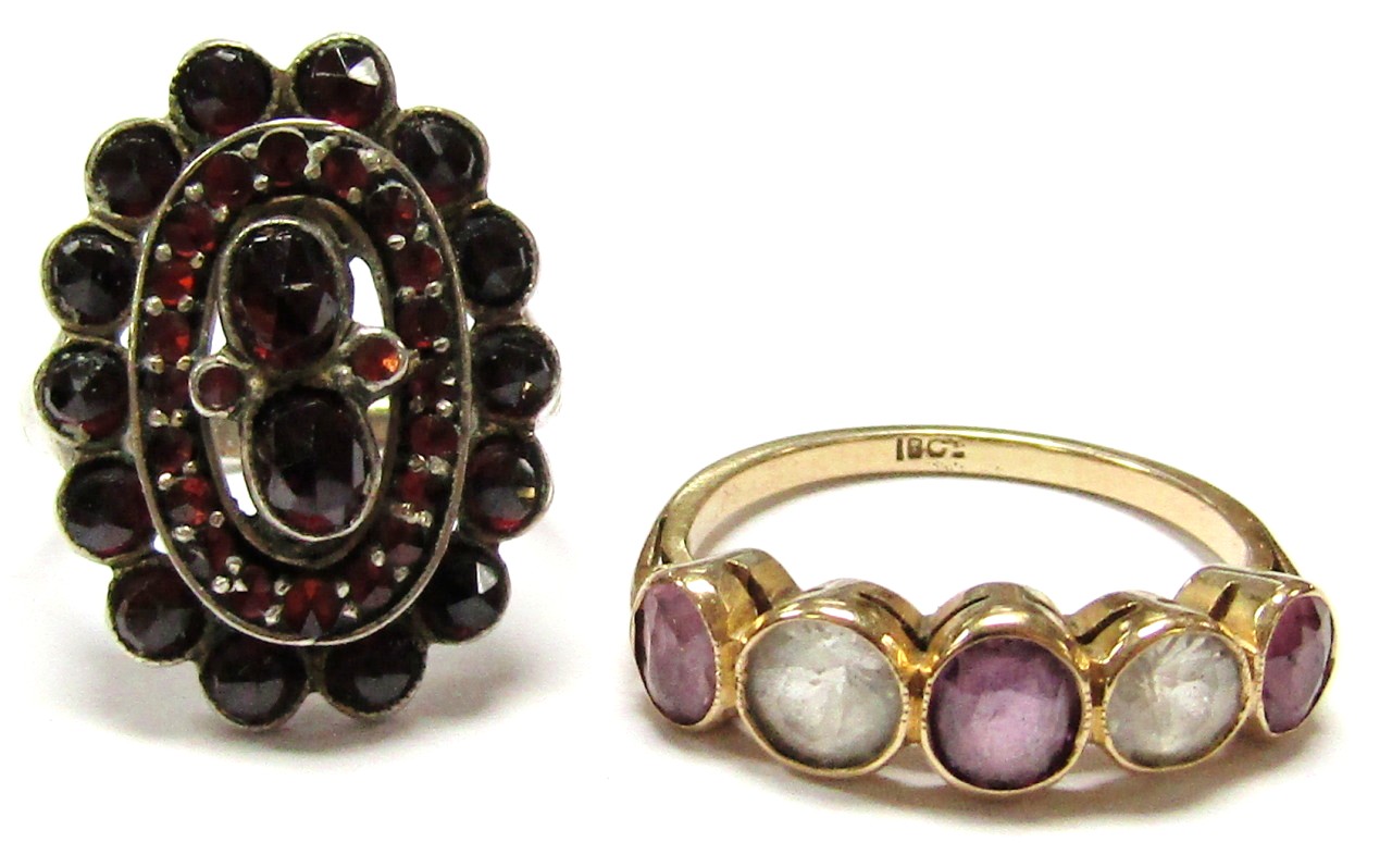 Appraisal: A ladies dress ring set with purple and white stones