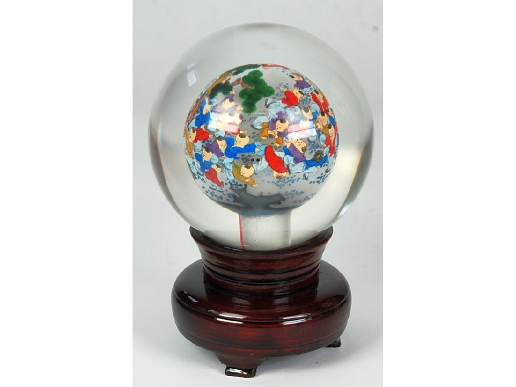 Appraisal: CHINESE GLASS HOLLOW BALL inside painted with numerous young children