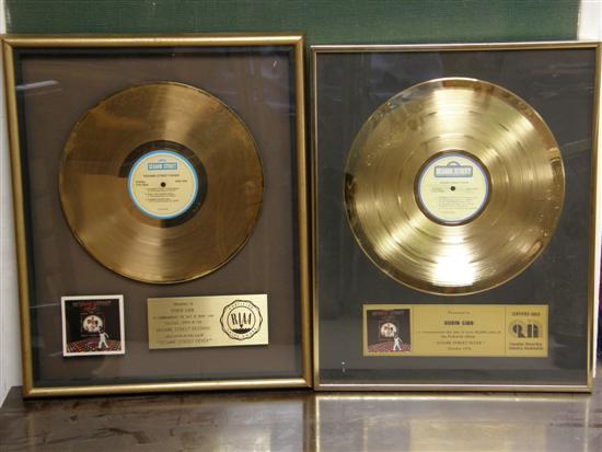 Appraisal: Two Gold discs presented to Robin Gibb the first by