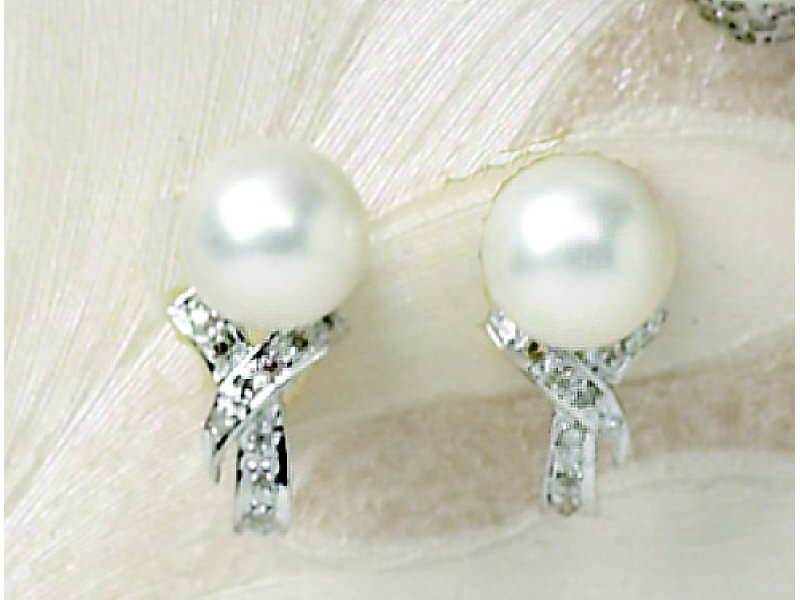 Appraisal: PEARL AND DIAMOND EARRINGS k white gold pierced earrings set