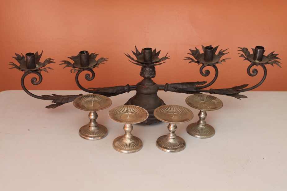 Appraisal: A five branch candleabra and a set of four pricket