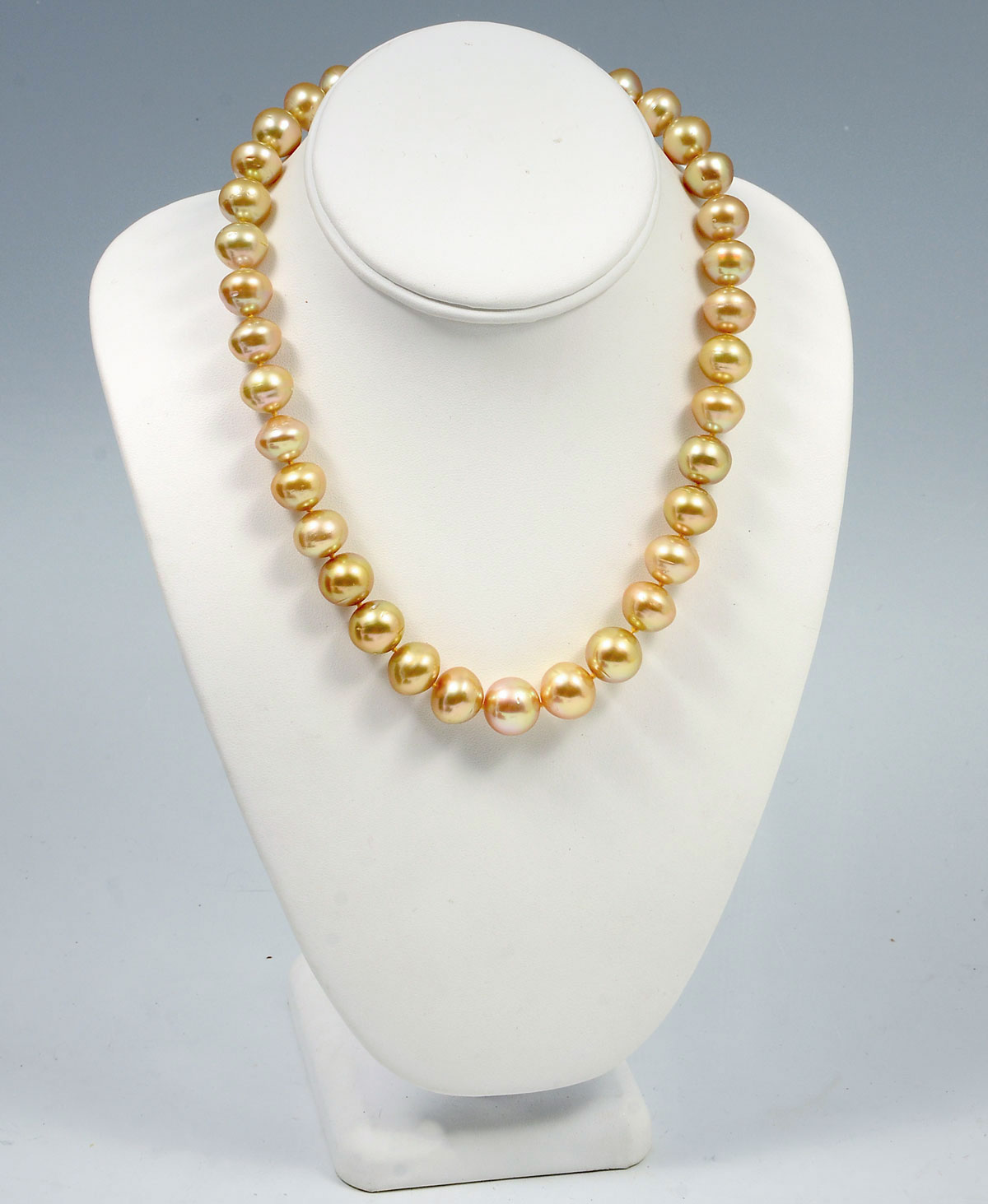 Appraisal: GOLDEN SOUTH SEA PEARL NECKLACE Single strand cultured graduated South