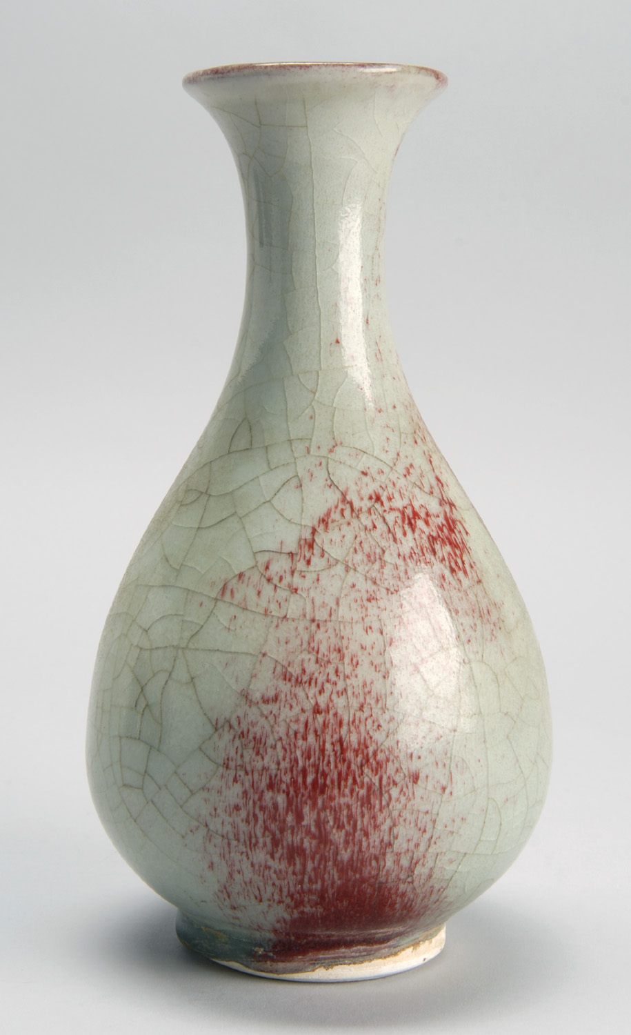 Appraisal: PEACHBLOOM GLAZE PORCELAIN VASE In pear shape with red-blush glaze