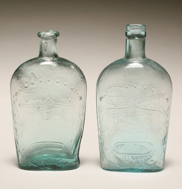 Appraisal: Pair aqua pint Union flasks both have embossed clasped hands