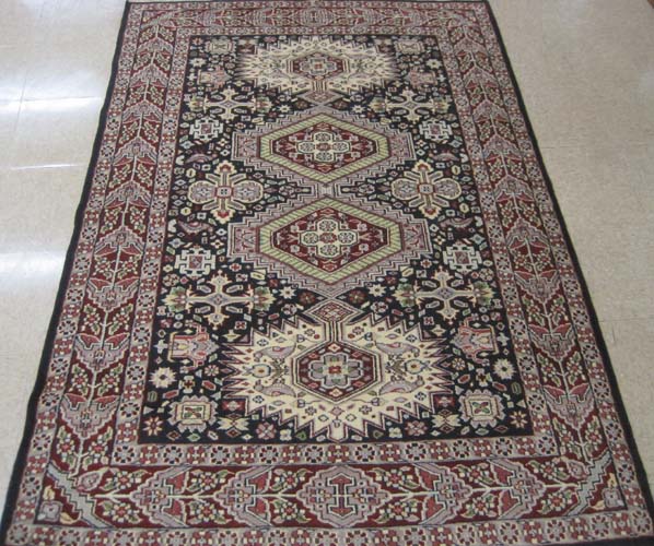 Appraisal: HAND KNOTTED ORIENTAL AREA RUG Indo-Persian New Zealand wool tribal