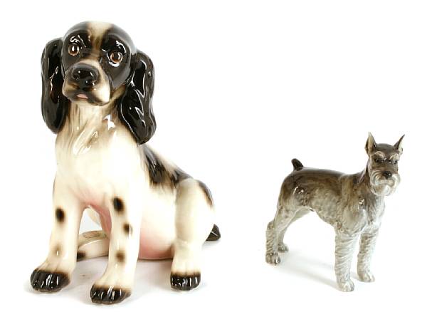 Appraisal: A collection of dog figurines in various media comprising two