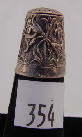 Appraisal: English silver thimble hand chased