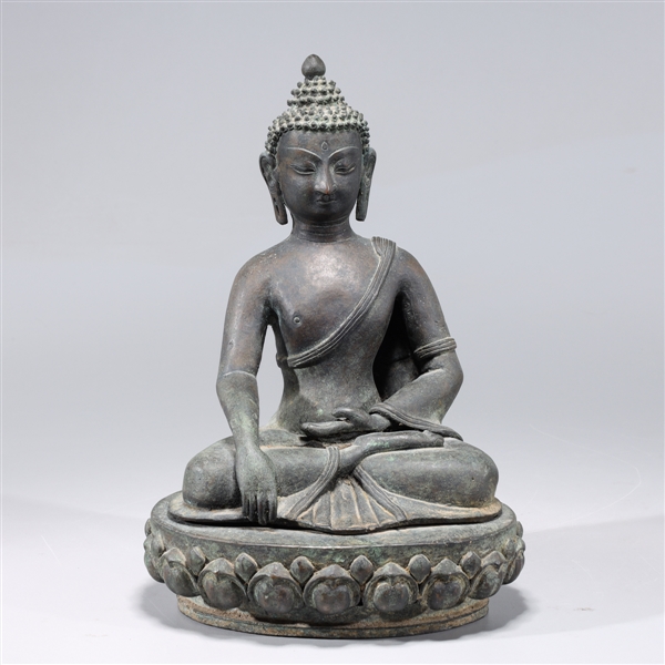 Appraisal: Chinese antique copper seated figure of Buddha atop lotus-form base