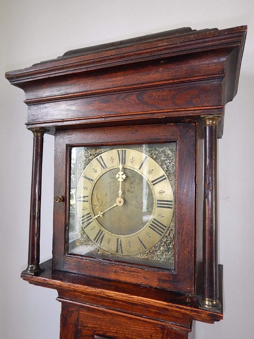 Appraisal: An thC elm longcase clock with square brass dial signed