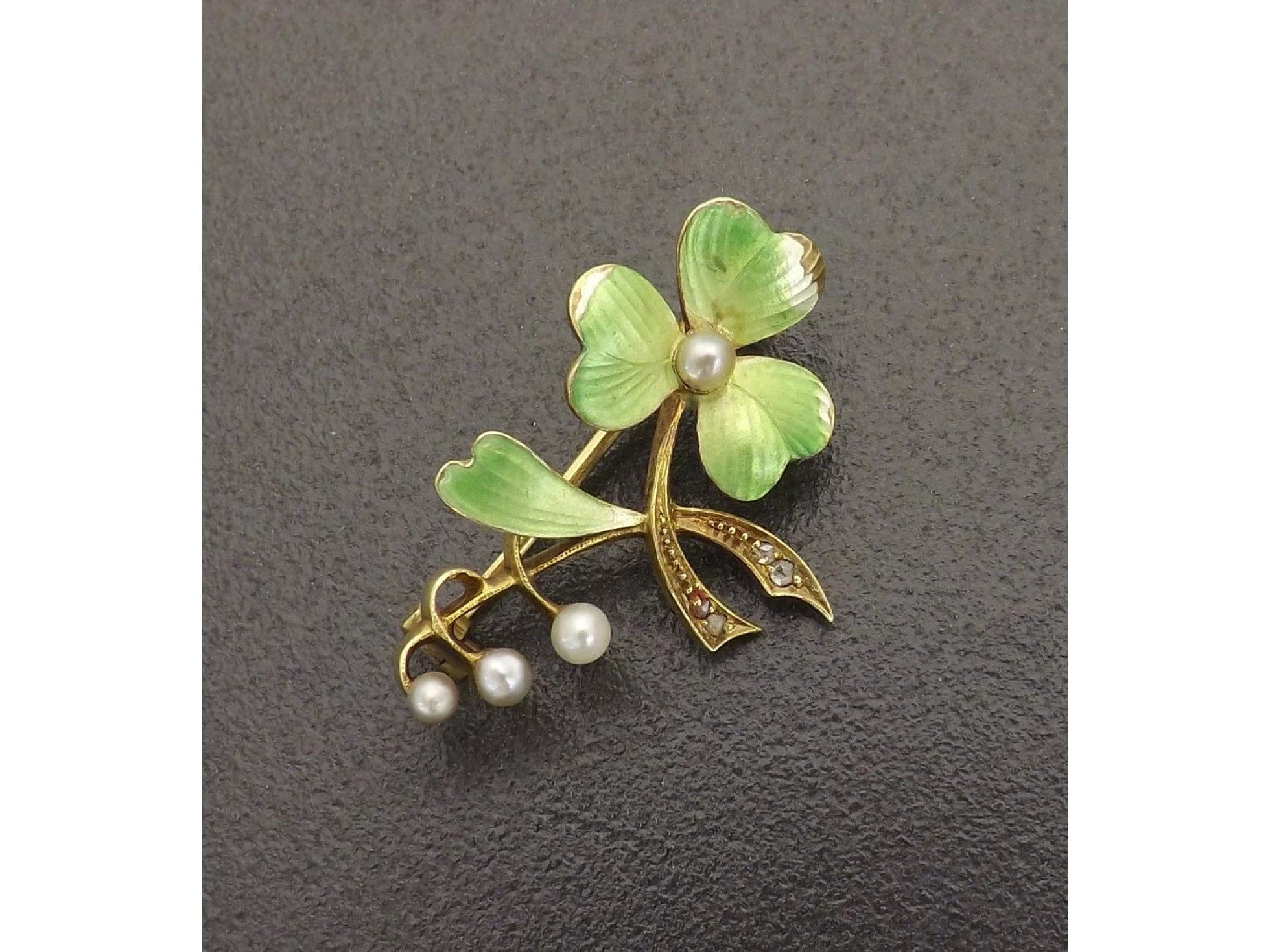 Appraisal: - -a ct seed pearl enamel and diamond clover brooch