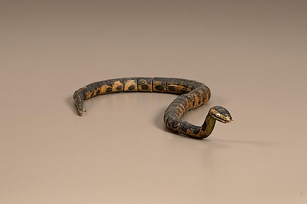 Appraisal: CARVED SNAKE FOLK ART American ca An articulated carved snake