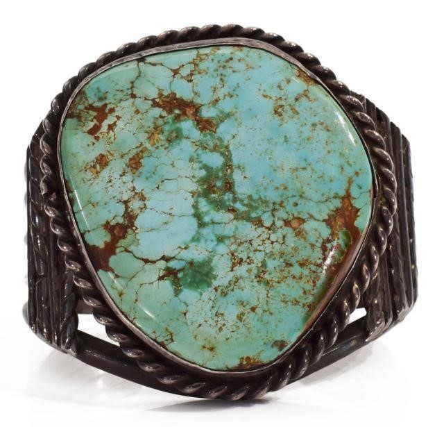 Appraisal: Native American silver content unknown cuff bracelet large bezel-set turquoise