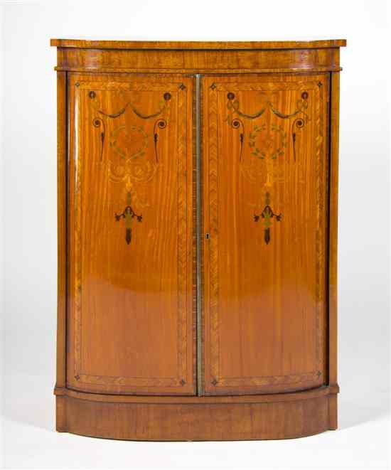 Appraisal: An Edwardian Satinwood Side Cabinet having a rectangular top with