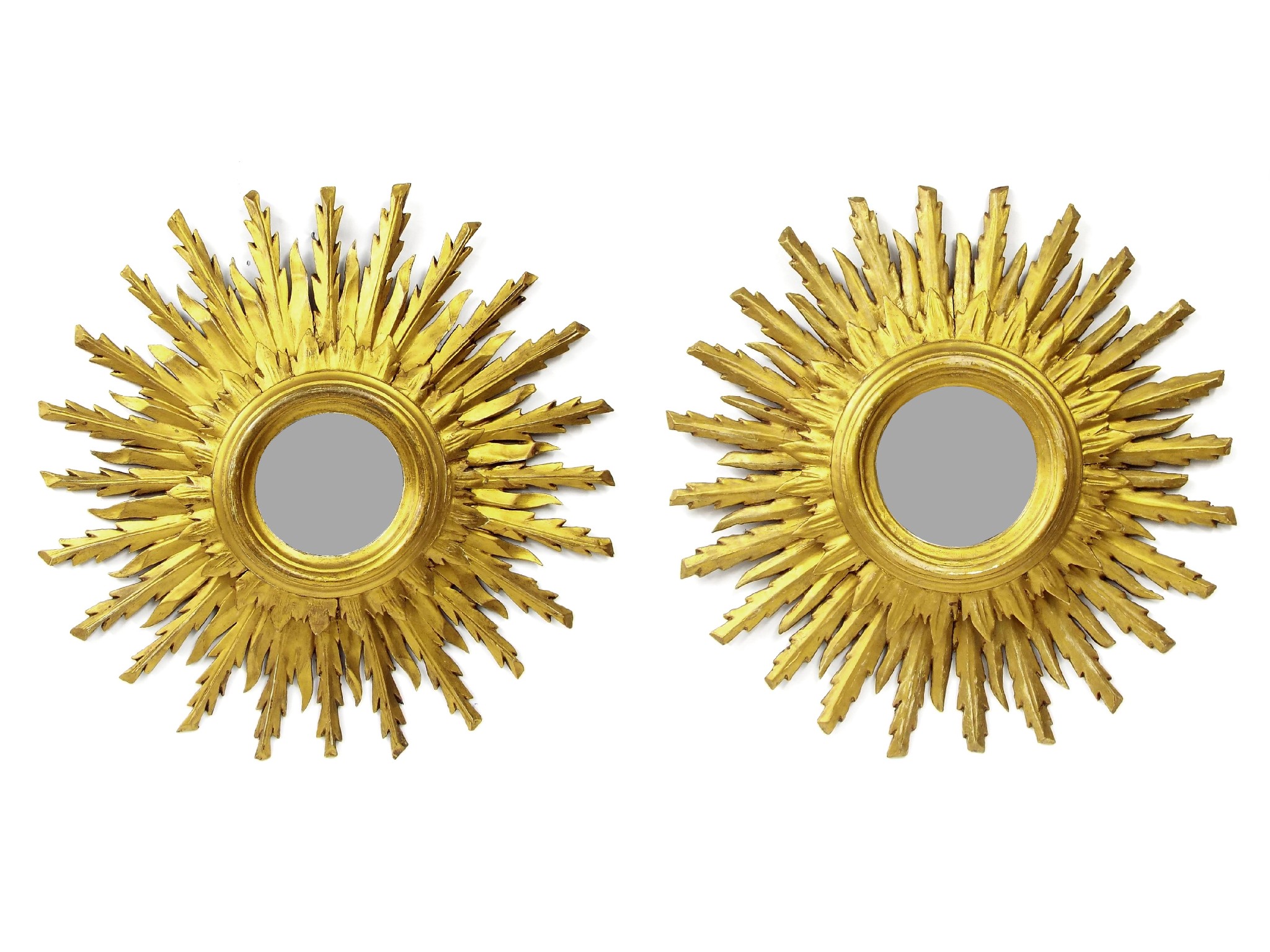 Appraisal: Good pair of giltwood and gesso sunburst wall mirrors with