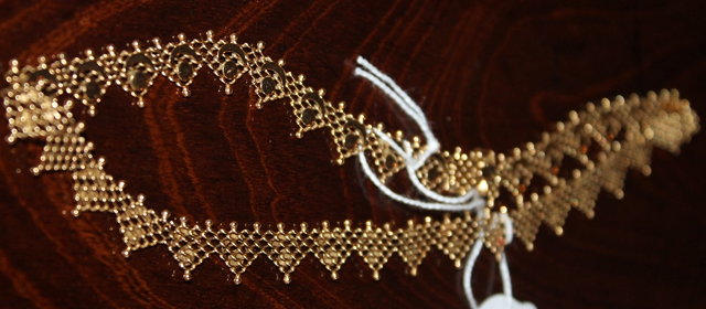 Appraisal: AN CT GOLD NECKLACE of stylised form grams