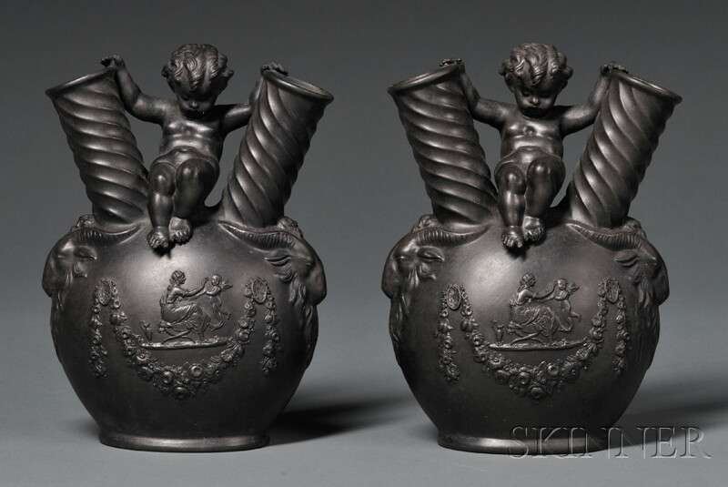 Appraisal: Pair of Wedgwood Black Basalt Figural Vases England mid- th