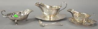 Appraisal: Three sterling silver gravy boats with under dish and ladle