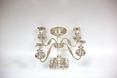 Appraisal: A silver plated epergne with four candle sconces on a