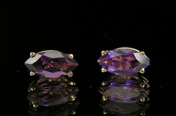 Appraisal: A Pair of Amethyst Stud Earrings k yellow gold mounts