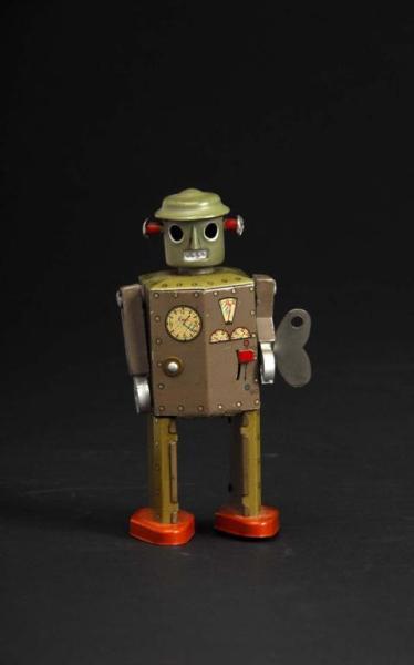 Appraisal: Tin Atomic Robot Man Description Japanese Cast metal arms version