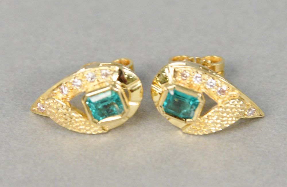 Appraisal: Pair of gold emerald and diamond earrings centering two emeralds