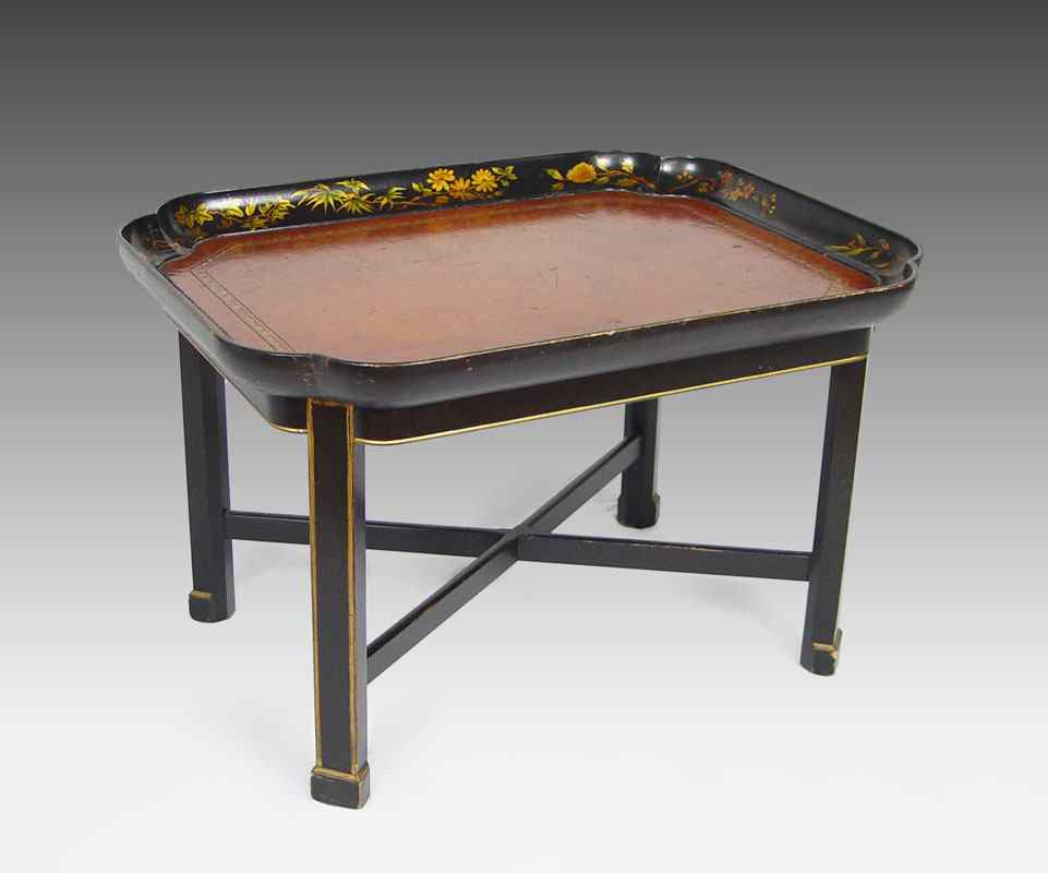 Appraisal: TOWLE DECORATED BLACK LACQUER TEA TABLE WITH LEATHER Tray on